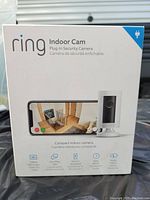 Box of Ring Indoor Cam showing product image and features.
