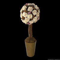 Full view of the blush and white roses floral topiary tree with brown twisted trunk and plain brown tapered pot on black background.