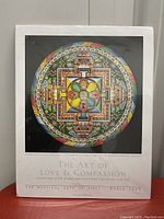 Full front view of the framed art print featuring the Tibetan mandala of Avalokiteshvara with title and exhibition details.