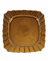 Overhead view of vintage brown ceramic stoneware serving platter showing scalloped rim and glossy brown finish.