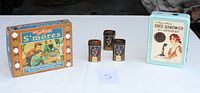 Overview of all items including Oreo tin, three tea tins, and S'mores box
