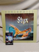 Equinox vinyl album cover with Styx Man of Miracles cassette tape in front