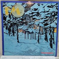 Front cover of the FM Tonight album showing snowy forest artwork with FM logo and Tonight text.
