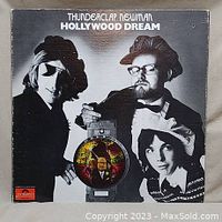 Front cover photo of Thunderclap Newman Hollywood Dream vinyl LP album. Black and white image with band members and album title.
