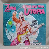 Front cover of Frank Zappa 'The Man from Utopia' vinyl album showing colorful cartoon art.