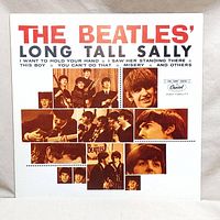 Front cover of The Beatles 'Long Tall Sally' vinyl album showing collage-style photos and track listing in red and black text.