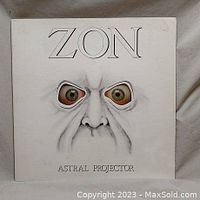 Front cover of vinyl record album 'Astral Projector' by Zon showing stylized face artwork.