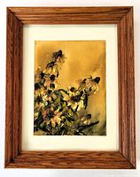 Framed floral oil painting featuring yellow and black flowers on a beige background with signature Parson visible.
