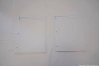 Two sheets of refill paper with three punched holes and University of Toronto Faculty of Applied Science & Engineering header visible