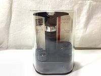 Peugeot Epivac Duo set sealed in clear plastic packaging showing pump and stoppers