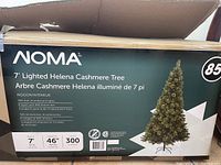 Photo of the original box showing branding, tree specifications and product information, including size, light count, and diameter.