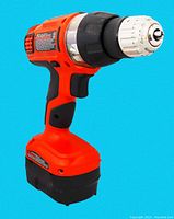 Side profile of Black & Decker 12V cordless drill with battery attached, showing ergonomic handle and trigger.