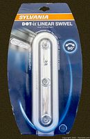 Front view of new in package Sylvania DOT.it Linear Swivel LED Tap Light showing product and packaging with branding and swivel feature.