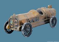 Front and side view of vintage 1974 Banthrico bronze #32 sportster racing coin bank with bronze patina and detailed number 32 on hood and sides.