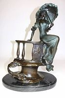 Front left-angled view showing full statue on white background