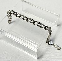 Full view of chainlink bracelet showing link style and closure.