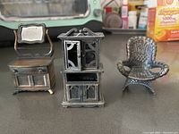 Image showing dresser, hutch, and rocking chair from front angle on table surface