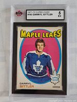 Front view of the 1971-72 O-Pee-Chee Darryl Sittler hockey card in Toronto Maple Leafs uniform, graded EX 5 by KSA, showing the grading label and card condition.