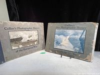 Two landscape photographic history books with visibly worn covers placed side by side, titles visible on the front covers.