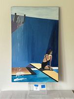 Frontal image of painting showing a woman in black swimsuit sitting on diving board next to pool with falling water feature.