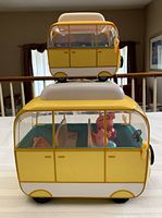 Photo showing the smaller camper wagon sitting on top of the larger camper wagon for scale and detail.