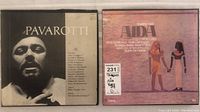 Front covers of two vintage LP box sets: Luciano Pavarotti recorded arias on left; Giuseppe Verdi's Aida featuring Maria Callas on right.