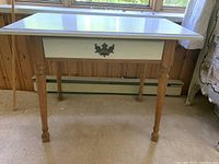 Photo of Drexel solid wood desk with white top and one drawer.