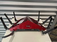 Front view of D-Link DIR-895L router showing multiple antennas and connectivity ports.