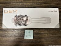 Box of GEM hot air brush showing product name and image on cover.