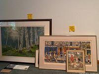 Large framed birch forest scene with green grass and water near the bottom, displayed against a white wall with a size note 36x28.