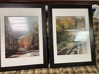 Two framed photographs showing autumn fall scenes from Arrowhead Provincial Park.