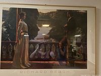 Framed Richard Bergh poster showing a man and woman on stone balcony overlooking a landscape, with title text beneath the image.