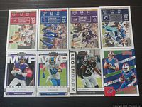 Eight NFL football trading cards from Game Day Ticket and MVP series with clear player images and card details visible.