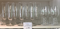 Photo showing four Riedel beer glasses alongside other stemmed beer glasses with various shapes and sizes.