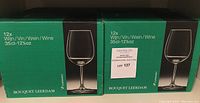 Two green original boxes labeled Bouquet Leerdam, each box states 12× wine glasses 35 cl (12 oz)