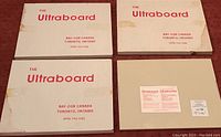 Three Ultraboard boxes showing the brand and manufacturer details from Ray-Cor Canada, Toronto, Ontario.