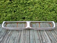 Front view of the full chrome grille showing two large rectangular openings and overall condition