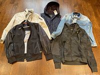 Overview of all five G-Star Raw outerwear items arranged on floor