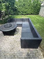 L-shaped configuration showing right-arm end module, two armless modules, inside corner, two armless and left-arm end modules around a patio