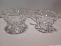 Open sugar bowl and creamer set, clear lead crystal with cut and etched stars and geometric patterns