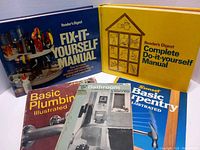 Five DIY home improvement books showing front cover artwork and titles.