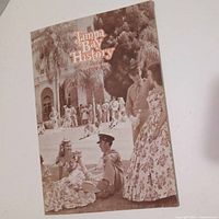 Front cover of vintage Tampa Bay History magazine showing people outdoors in period dress.