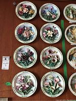 Overall view of all eight plates mounted on wall