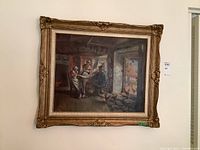Framed painting on wall showing entire canvas and ornate frame