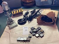 Overview photo showing Calrad DS-3 microphone on stand, Olson mixer, two other microphones with cords, remote pause adapter, and a paper bag with vintage radio crystals.