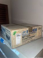 Original box for Fisher MT-125C stereo turntable with branding and model info printed on side.