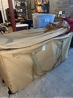 Closed beige Frontgate storage bag