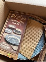 Photo of the original box showing the 20-piece Ironstone Faience service set for 4 by Ironstone Jeanne d'Arc.
