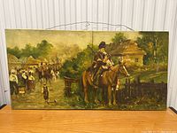 Full view of the oil painting showing village scene with horsemen, cottages, and path.