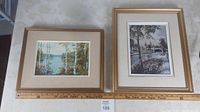 Two framed prints side by side on a light background with ruler for scale showing the size of prints.
